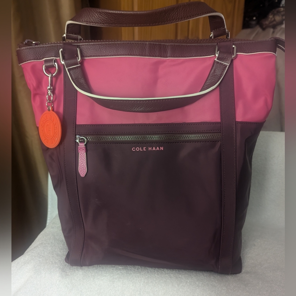 Cole Haan Pink and Burgundy Tote-Style Backpack with Orange Charm